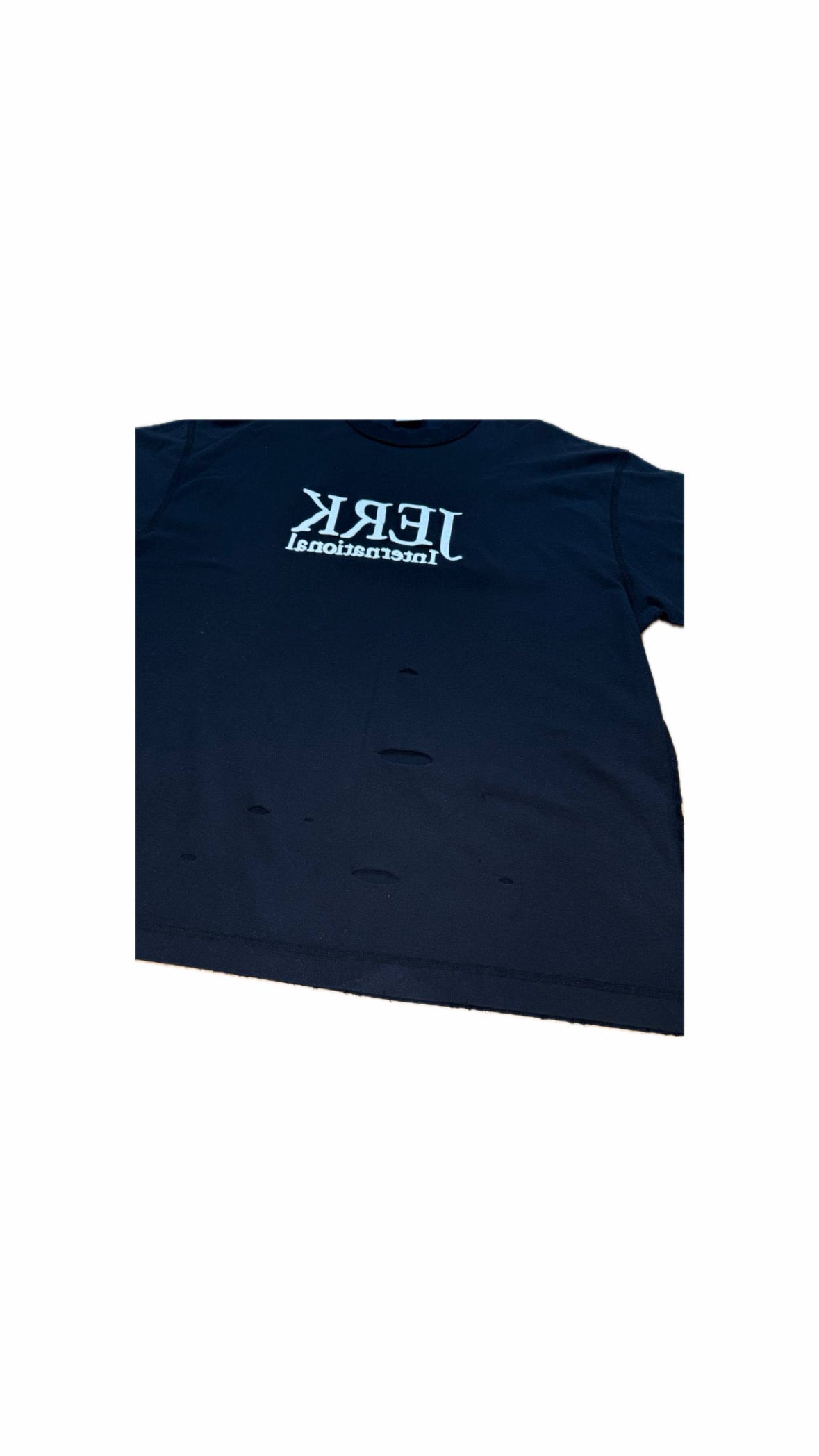 VETEMENTS “JERK” DISTRESSED T-SHIRT